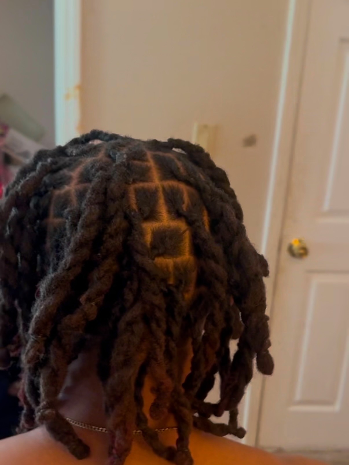 Fresh loc retwist with clean parts