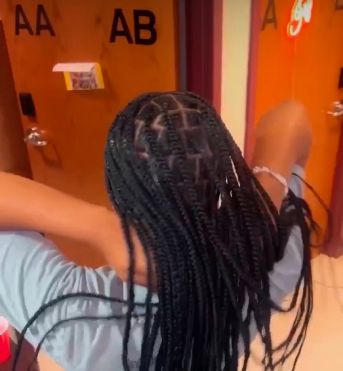 Smedium knotless braids, back view